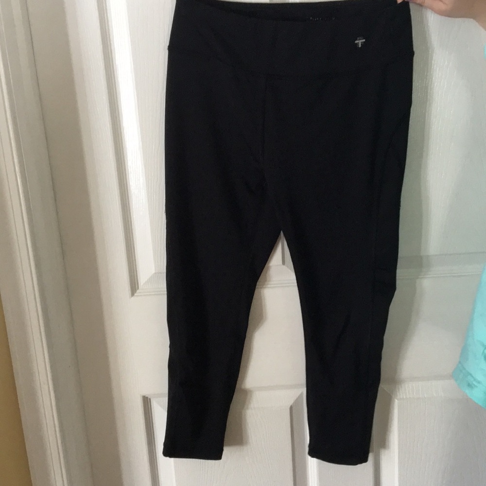 black leggings by the brand therapy.
